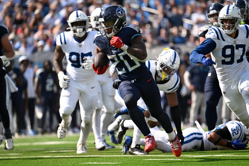 Tennessee Titans running back Tony Pollard (20) runs for a touchdown during the second half of an NFL football game against the Indianapolis Colts, Sunday, Oct. 13, 2024, in Nashville, Tenn. (AP Photo/John Amis)