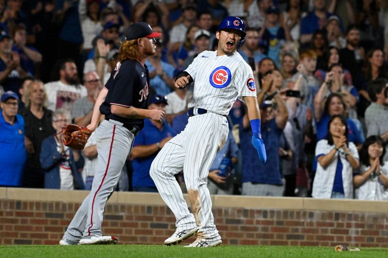 Jul 19, 2023; Chicago, Illinois, USA;  Chicago Cubs right fielder Seiya Suzuki (27) yells while scoring against the Washington Nationals during the eighth inning at Wrigley Field. Mandatory Credit: Matt Marton-USA TODAY Sports