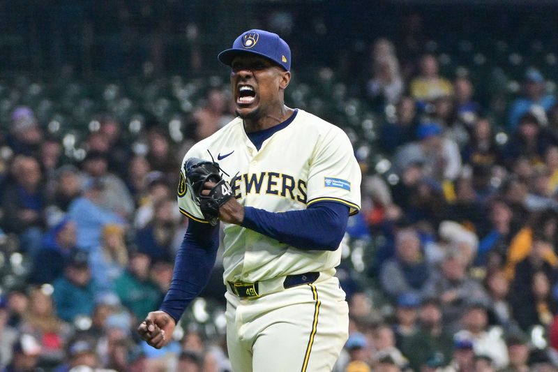 Apr 7, 2024; Milwaukee, Wisconsin, USA; Milwaukee Brewers pitcher Thyago Vieira (49) reacts after striking out Seattle Mariners designated hitter Mitch Garver (not pictured) in the eighth inning at American Family Field. Mandatory Credit: Benny Sieu-USA TODAY Sports