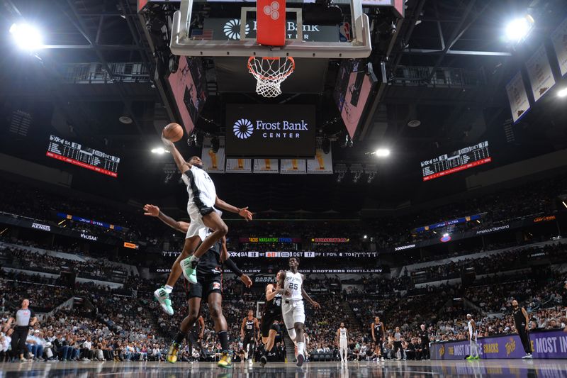 SAN ANTONIO, TX - APRIL 14: Blake Wesley #14 of the San Antonio Spurs drives to the basket during the game  against the Detroit Pistons on April 14, 2024 at the Frost Bank Center in San Antonio, Texas. NOTE TO USER: User expressly acknowledges and agrees that, by downloading and or using this photograph, user is consenting to the terms and conditions of the Getty Images License Agreement. Mandatory Copyright Notice: Copyright 2024 NBAE (Photos by Michael Gonzales/NBAE via Getty Images)