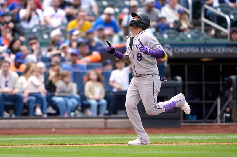Jun 1, 2025; New York City, New York, USA; Colorado Rockies second baseman Orlando Arcia (8) reacts to hitting a home run as he rounds the bases against the New York Mets during the third inning at Citi Field. Mandatory Credit: Gregory Fisher-Imagn Images