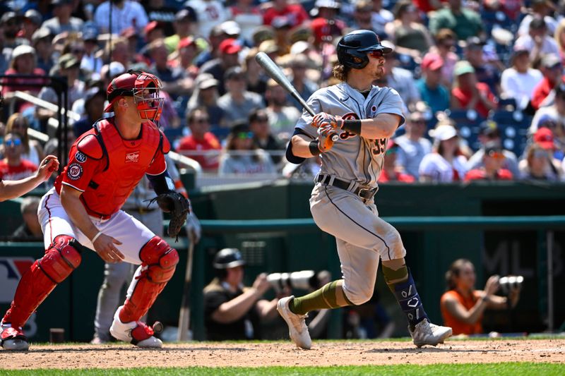 May 21, 2023; Washington, District of Columbia, USA; Detroit Tigers third baseman Zach McKinstry (39) hits a RBI single against the Washington Nationals during the sixth inning at Nationals Park. Mandatory Credit: Brad Mills-USA TODAY Sports