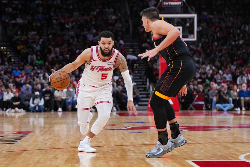 HOUSTON, TEXAS - DECEMBER 27: Fred VanVleet #5 of the Houston Rockets dribbles the ball in the third quarter of the game against the Phoenix Suns at Toyota Center on December 27, 2023 in Houston, Texas. User expressly acknowledges and agrees that, by downloading and or using this photograph, User is consenting to the terms and conditions of the Getty Images License Agreement. (Photo by Alex Bierens de Haan/Getty Images)