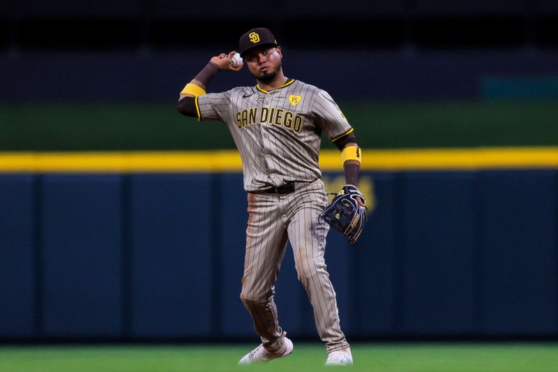 May 21, 2024; Cincinnati, Ohio, USA; San Diego Padres second baseman Luis Arraez (4) throws to first to get Cincinnati Reds catcher Tyler Stephenson (not pictured) out in the eighth inning at Great American Ball Park. Mandatory Credit: Katie Stratman-USA TODAY Sports