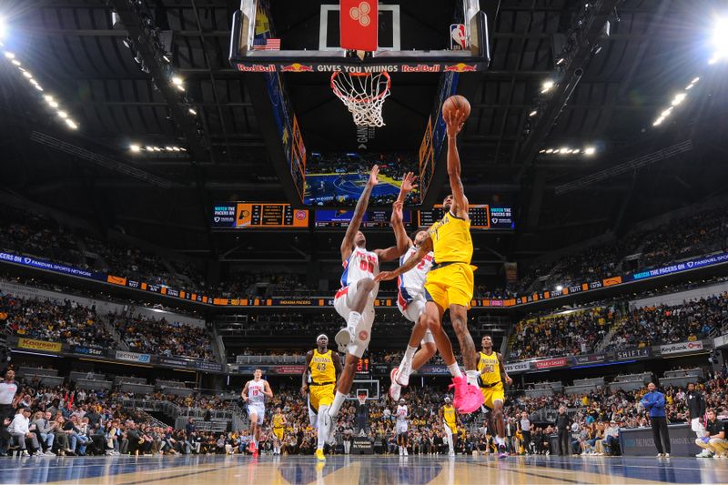 INDIANAPOLIS, IN - NOVEMBER 29:  Obi Toppin #1 of the Indiana Pacers drives to the basket during the game against the Detroit Pistons during the Emirates NBA Cup game on November 29, 2024 at Gainbridge Fieldhouse in Indianapolis, Indiana. NOTE TO USER: User expressly acknowledges and agrees that, by downloading and or using this Photograph, user is consenting to the terms and conditions of the Getty Images License Agreement. Mandatory Copyright Notice: Copyright 2024 NBAE (Photo by Ron Hoskins/NBAE via Getty Images)