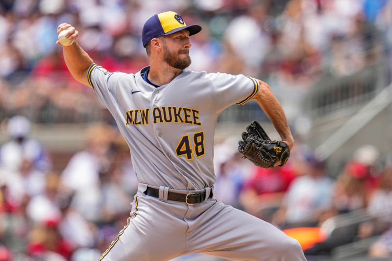 Jul 30, 2023; Cumberland, Georgia, USA; Milwaukee Brewers starting pitcher Colin Rea (48) pitches against the Atlanta Braves during the first inning at Truist Park. Mandatory Credit: Dale Zanine-USA TODAY Sports