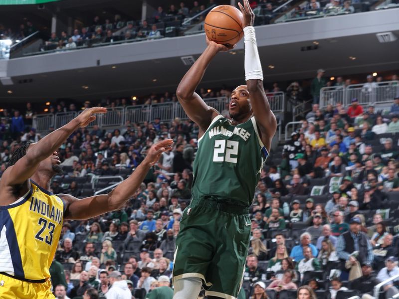 MILWAUKEE, WI - APRIL 21:  Khris Middleton #22 of the Milwaukee Bucks shoots the ball during the game  against the Indiana Pacers during Round 1 Game 1 of the 2024 NBA Playoffs  on April 21, 2024 at the Fiserv Forum Center in Milwaukee, Wisconsin. NOTE TO USER: User expressly acknowledges and agrees that, by downloading and or using this Photograph, user is consenting to the terms and conditions of the Getty Images License Agreement. Mandatory Copyright Notice: Copyright 2024 NBAE (Photo by Jeff Haynes/NBAE via Getty Images).