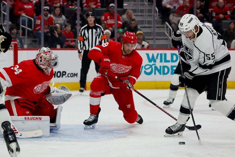 Jan 13, 2024; Detroit, Michigan, USA;  Los Angeles Kings right wing Quinton Byfield (55) shoots and scores on Detroit Red Wings goaltender Alex Lyon (34) in the first period at Little Caesars Arena. Mandatory Credit: Rick Osentoski-USA TODAY Sports