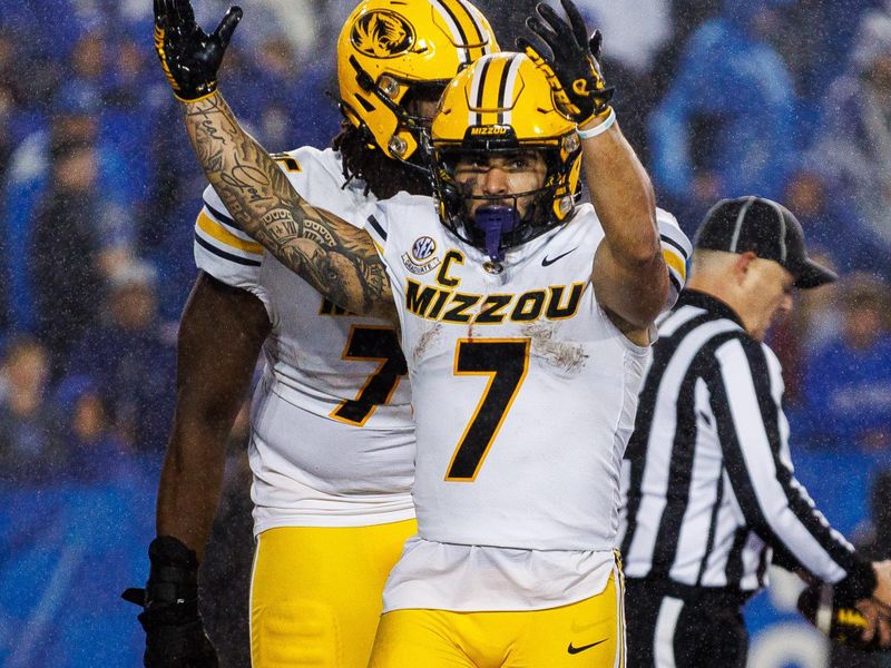 Oct 14, 2023; Lexington, Kentucky, USA; Missouri Tigers running back Cody Schrader (7) celebrates after scoring a touchdown during the fourth quarter against the Kentucky Wildcats at Kroger Field. Mandatory Credit: Jordan Prather-USA TODAY Sports