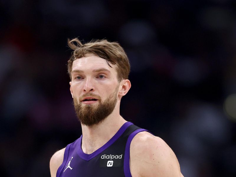 LOS ANGELES, CALIFORNIA - FEBRUARY 25: Domantas Sabonis #10 of the Sacramento Kings looks on during the third quarter against the Los Angeles Clippers at Crypto.com Arena on February 25, 2024 in Los Angeles, California. The Sacramento Kings defeated the Los Angeles Clippers 123-107. NOTE TO USER: User expressly acknowledges and agrees that, by downloading and or using this photograph, User is consenting to the terms and conditions of the Getty Images License Agreement. (Photo by Katelyn Mulcahy/Getty Images)