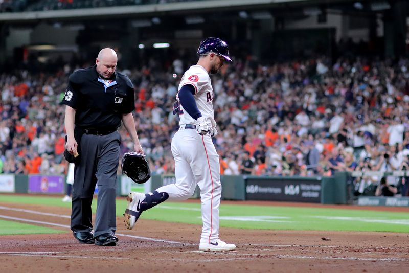 May 14, 2024; Houston, Texas, USA; Houston Astros third baseman Alex Bregman (2) crosses home plate after hitting a solo home run to left field against the Oakland Athletics during the second inning at Minute Maid Park. Mandatory Credit: Erik Williams-USA TODAY Sports