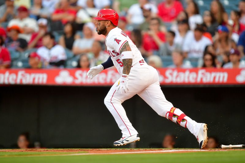 May 10, 2025; Anaheim, California, USA; Los Angeles Angels third baseman Yoán Moncada (5) runs after hitting an RBI single against the Baltimore Orioles during the first inning at Angel Stadium. Mandatory Credit: Gary A. Vasquez-Imagn Images