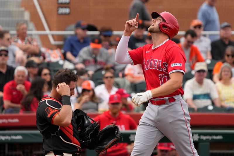 Feb 26, 2024; Scottsdale, Arizona, USA; Los Angeles Angels first baseman Hunter Dozier (17) reacts after hitting a three run home run against the San Francisco Giants in the first inning at Scottsdale Stadium. Mandatory Credit: Rick Scuteri-USA TODAY Sports