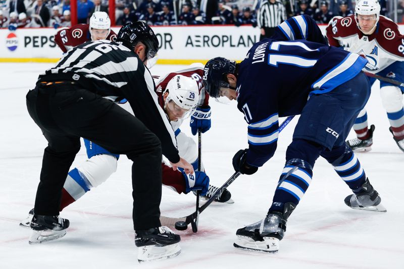 Apr 23, 2024; Winnipeg, Manitoba, CAN; Winnipeg Jets forward Mark Scheifele (55) face off against Colorado Avalanche forward Nathan MacKinnon (29) during the first period in game two of the first round of the 2024 Stanley Cup Playoffs at Canada Life Centre. Mandatory Credit: Terrence Lee-USA TODAY Sports