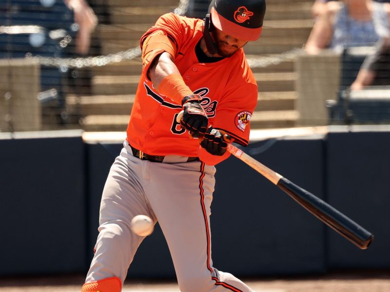 Mar 11, 2024; Tampa, Florida, USA; Baltimore Orioles catcher Michael Perez (63)  hits a RBI single during the second inning against the New York Yankees  at George M. Steinbrenner Field. Mandatory Credit: Kim Klement Neitzel-USA TODAY Sports