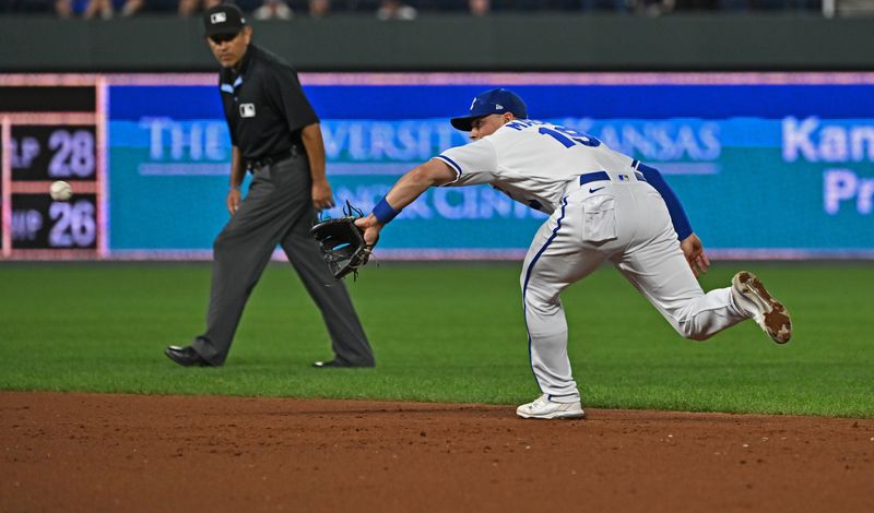 Sep 19, 2023; Kansas City, Missouri, USA; Kansas City Royals second baseman Michael Massey (19) catches a line drive for an out in the ninth inning against the Cleveland Guardians at Kauffman Stadium. Mandatory Credit: Peter Aiken-USA TODAY Sports