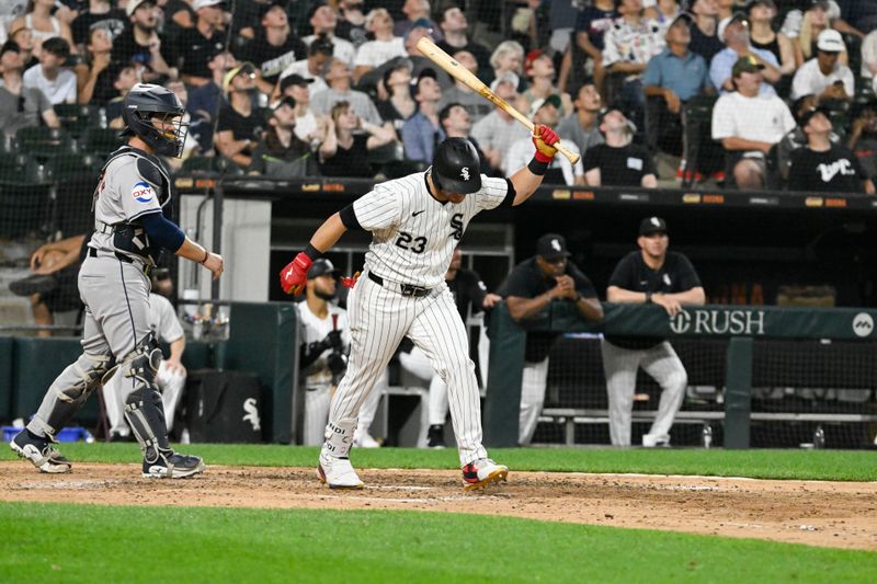 Jun 19, 2024; Chicago, Illinois, USA;  Chicago White Sox outfielder Andrew Benintendi (23) throws his bat after popping out during the sixth inning against the Houston Astros at Guaranteed Rate Field. Mandatory Credit: Matt Marton-USA TODAY Sports