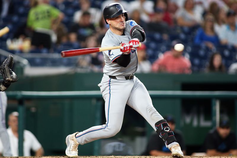 Sep 13, 2024; Washington, District of Columbia, USA; Miami Marlins catcher Nick Fortes (4) lines out during the third inning of a baseball game against the Washington Nationals, at Nationals Park. Mandatory Credit: Daniel Kucin Jr.-Imagn Images

