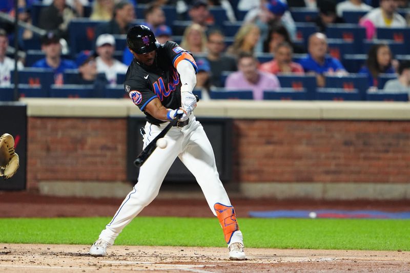 Jun 14, 2024; New York City, New York, USA; New York Mets right fielder Starling Marte (6) hits a single against the San Diego Padres  during the second inning at Citi Field. Mandatory Credit: Gregory Fisher-USA TODAY Sports