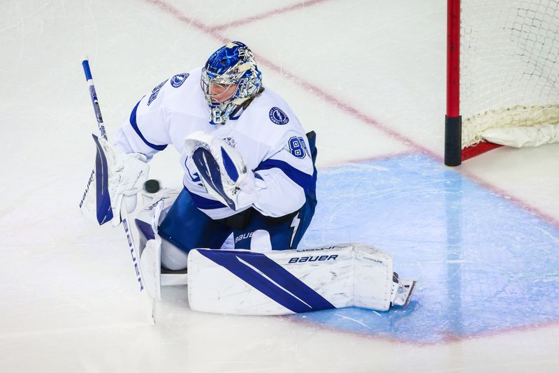 Jan 21, 2023; Calgary, Alberta, CAN; Tampa Bay Lightning goaltender Andrei Vasilevskiy (88) guards his net during the warmup period against the Calgary Flames at Scotiabank Saddledome. Mandatory Credit: Sergei Belski-USA TODAY Sports