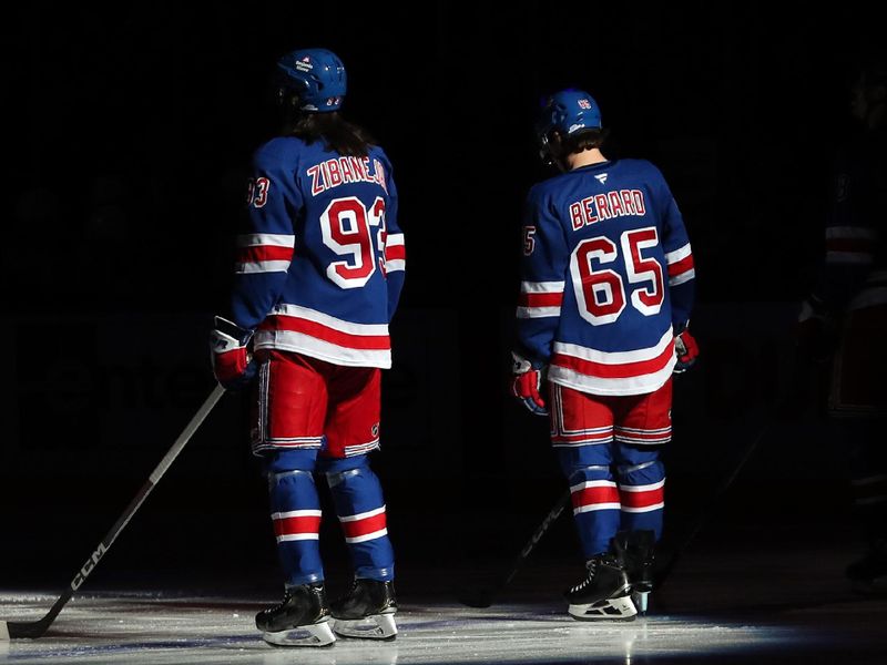 Nov 25, 2024; New York, New York, USA; New York Rangers left wing Brett Berard (65) and center Mika Zibanejad (93) line up before the first period against the St. Louis Blues at Madison Square Garden. Berard made his NHL debut. Mandatory Credit: Danny Wild-Imagn Images
