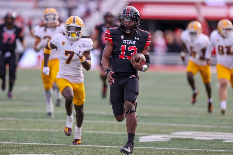 Nov 4, 2023; Salt Lake City, Utah, USA; Utah Utes quarterback Nate Johnson (13) runs for a touchdown past Arizona State Sun Devils defensive back Shamari Simmons (7) in the fourth quarter at Rice-Eccles Stadium. Mandatory Credit: Rob Gray-USA TODAY Sports