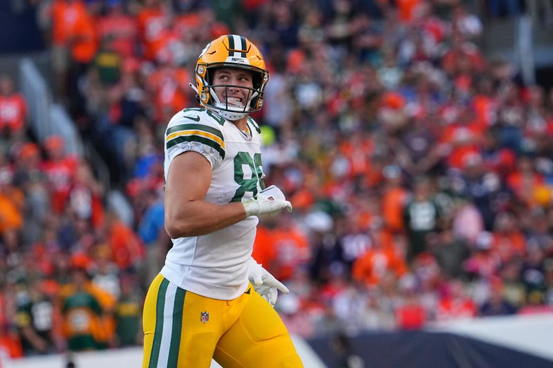 Green Bay Packers tight end Ben Sims (89) reacts to a play against Denver Broncos safety Kareem Jackson (22) of an NFL football game Sunday October 22, 2023, in Denver. (AP Photo/Bart Young)