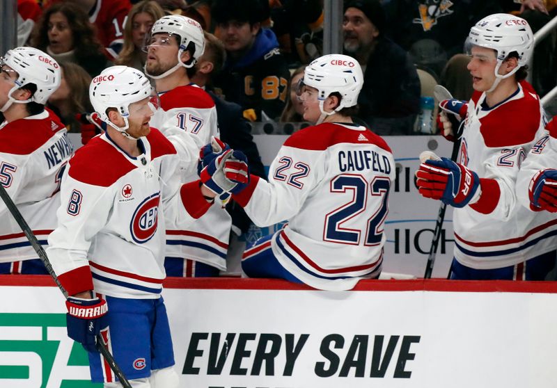 Feb 22, 2024; Pittsburgh, Pennsylvania, USA; Montreal Canadiens defenseman Mike Matheson (8) celebrates his goal with the Canadiens bench against the Pittsburgh Penguins during the first period at PPG Paints Arena. Mandatory Credit: Charles LeClaire-USA TODAY Sports