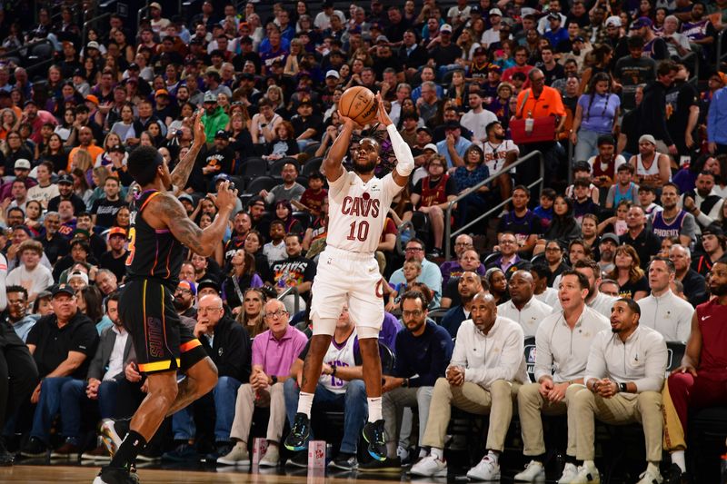 PHOENIX, AZ - APRIL  3: Darius Garland #10 of the Cleveland Cavaliers shoots a three point basket during the game against the Phoenix Suns on April 3, 2024 at Footprint Center in Phoenix, Arizona. NOTE TO USER: User expressly acknowledges and agrees that, by downloading and or using this photograph, user is consenting to the terms and conditions of the Getty Images License Agreement. Mandatory Copyright Notice: Copyright 2024 NBAE (Photo by Kate Frese/NBAE via Getty Images)