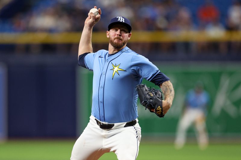 Apr 24, 2024; St. Petersburg, Florida, USA;  Tampa Bay Rays pitcher Chris Devenski (48) throws a pitch against the Detroit Tigers in the sixth inning at Tropicana Field. Mandatory Credit: Nathan Ray Seebeck-USA TODAY Sports