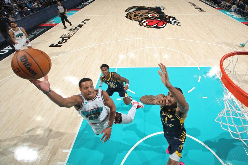 MEMPHIS, TN - DECEMBER 1: Desmond Bane #22 of the Memphis Grizzlies drives to the basket during the game against the Indiana Pacers on December 1, 2024 at FedExForum in Memphis, Tennessee. NOTE TO USER: User expressly acknowledges and agrees that, by downloading and or using this photograph, User is consenting to the terms and conditions of the Getty Images License Agreement. Mandatory Copyright Notice: Copyright 2024 NBAE (Photo by Joe Murphy/NBAE via Getty Images)