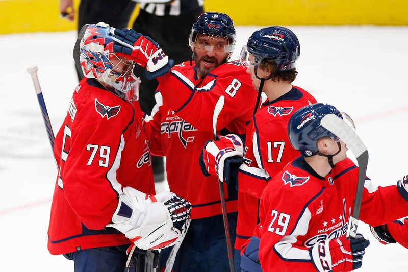 Nov 18, 2023; Washington, District of Columbia, USA; Washington Capitals goaltender Charlie Lindgren (79) celebrates with Capitals left wing Alex Ovechkin (8) after defeating the Columbus Blue Jackets during the third period at Capital One Arena. Mandatory Credit: Amber Searls-USA TODAY Sports