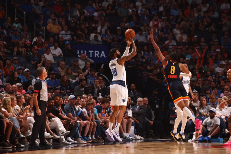 OKLAHOMA CITY, OK - APRIL 14:  Markieff Morris #88 of the Dallas Mavericks shoots a three point basket during the game against the Oklahoma City Thunder on April 14, 2024 at Paycom Arena in Oklahoma City, Oklahoma. NOTE TO USER: User expressly acknowledges and agrees that, by downloading and or using this photograph, User is consenting to the terms and conditions of the Getty Images License Agreement. Mandatory Copyright Notice: Copyright 2024 NBAE (Photo by Zach Beeker/NBAE via Getty Images)