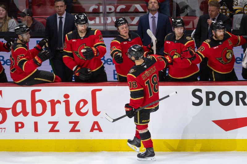 Oct 27, 2025; Ottawa, Ontario, CAN; Ottawa Senators center Tim Stutzle (18) celebrates with teammates after scoring a goal in the third period against the Boston Bruins at the Canadian Tire Centre. Mandatory Credit: Marc DesRosiers-IMAGN Images