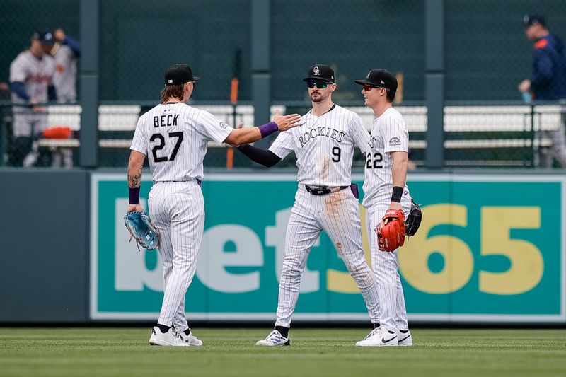 Apr 30, 2025; Denver, Colorado, USA; Colorado Rockies left fielder Jordan Beck (27) celebrates with center fielder Brenton Doyle (9) and outfielder Mickey Moniak (22) after the game against the Atlanta Braves at Coors Field. Mandatory Credit: Isaiah J. Downing-Imagn Images