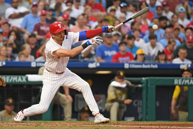 Jun 30, 2025; Philadelphia, Pennsylvania, USA; Philadelphia Phillies shortstop Trea Turner (7) hits an RBI single during the fourth inning against the San Diego Padres at Citizens Bank Park. Mandatory Credit: Eric Hartline-Imagn Images