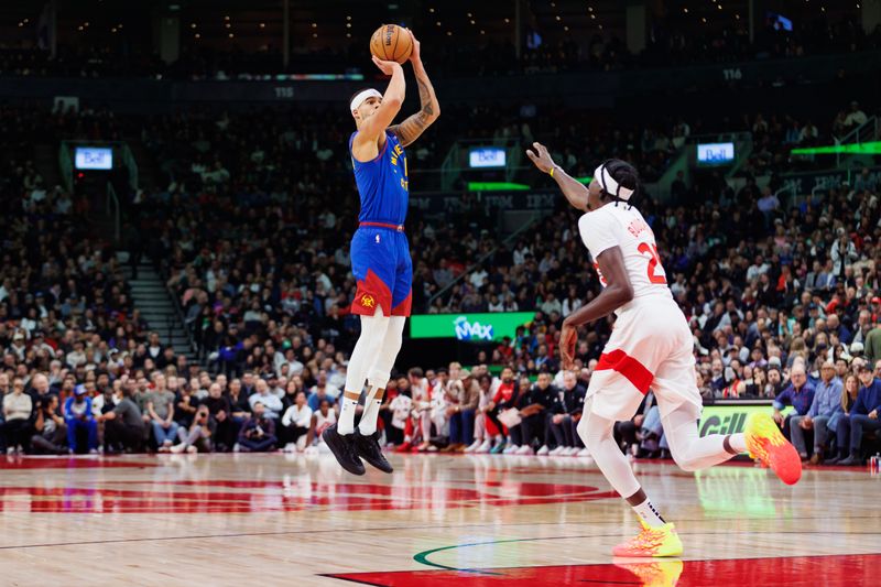 TORONTO, CANADA - OCTOBER 28: Michael Porter Jr. #1 of the Denver Nuggets puts up a shot over Chris Boucher #25 of the Toronto Raptors during the first half of their NBA game at Scotiabank Arena on October 28, 2024 in Toronto, Ontario, Canada. NOTE TO USER: User expressly acknowledges and agrees that, by downloading and or using this photograph, User is consenting to the terms and conditions of the Getty Images License Agreement. (Photo by Cole Burston/Getty Images)