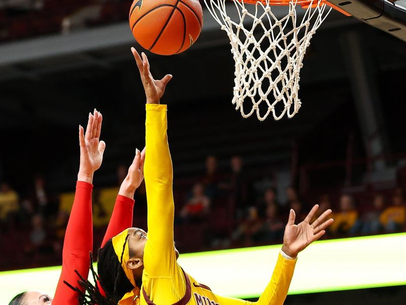 Feb 8, 2024; Minneapolis, Minnesota, USA; Minnesota Golden Gophers guard Janay Sanders (30) shoots as Ohio State Buckeyes forward Rebeka Mikulasikova (23) defends during the first half at Williams Arena. Mandatory Credit: Matt Krohn-USA TODAY Sports