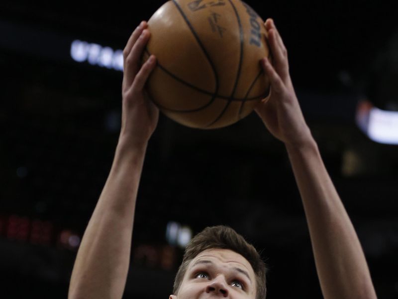 SAN ANTONIO, TX - DECEMBER 26:  Walker Kessler #24 of the Utah Jazz takes warm up shots before their game against the San Antonio Spurs at AT&T Center on December 26, 2022 in San Antonio, Texas. NOTE TO USER: User expressly acknowledges and agrees that, by downloading and or using this photograph, User is consenting to terms and conditions of the Getty Images License Agreement. (Photo by Ronald Cortes/Getty Images)