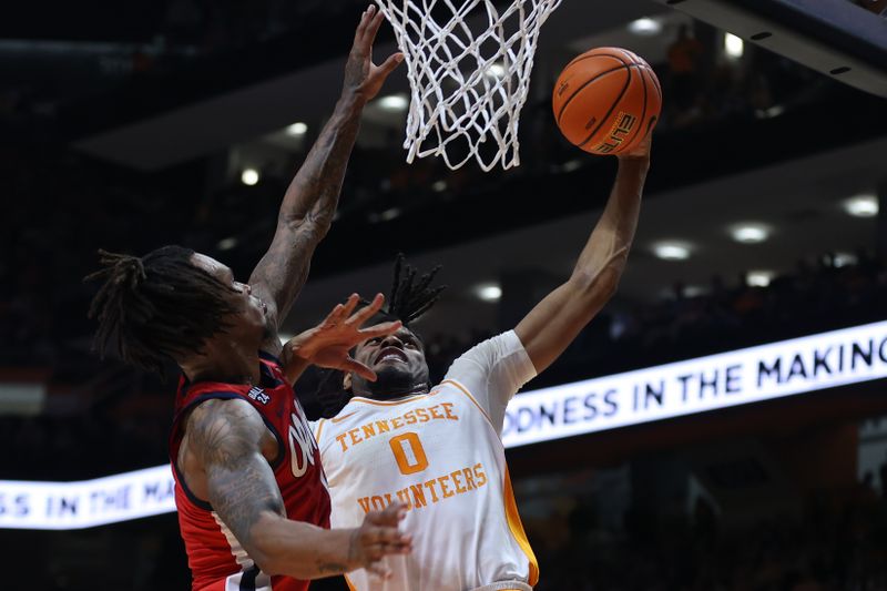 Jan 6, 2024; Knoxville, Tennessee, USA; Tennessee Volunteers forward Jonas Aidoo (0) goes to the basket against the Mississippi Rebels during the first half at Thompson-Boling Arena at Food City Center. Mandatory Credit: Randy Sartin-USA TODAY Sports