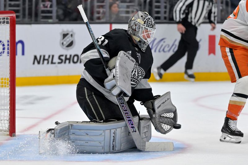 Dec 27, 2025; Los Angeles, California, USA;  Los Angeles Kings goaltender Anton Forsberg (31) makes a glove save in the third period against the Anaheim Ducks at Crypto.com Arena. Mandatory Credit: Jayne Kamin-Oncea-Imagn Images