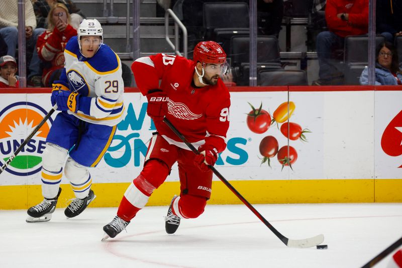 Nov 2, 2024; Detroit, Michigan, USA Detroit Red Wings center Joe Veleno (90) handles the puck during the first inning of the game against the Buffalo Sabres at Little Caesars Arena. Mandatory Credit: Brian Bradshaw Sevald-Imagn Images