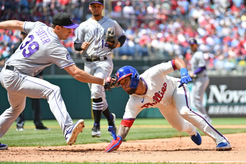 Apr 23, 2023; Philadelphia, Pennsylvania, USA; Philadelphia Phillies third baseman Edmundo Sosa (33) is tagged out by Colorado Rockies relief pitcher Brent Suter (39) after being picked off and caught in a rundown during the fifth inning at Citizens Bank Park. Mandatory Credit: Eric Hartline-USA TODAY Sports