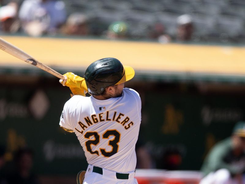 Jul 6, 2024; Oakland, California, USA; Oakland Athletics catcher Shea Langeliers (23) follows through on his two-run home run against the Baltimore Orioles during the third inning at Oakland-Alameda County Coliseum. Mandatory Credit: D. Ross Cameron-USA TODAY Sports