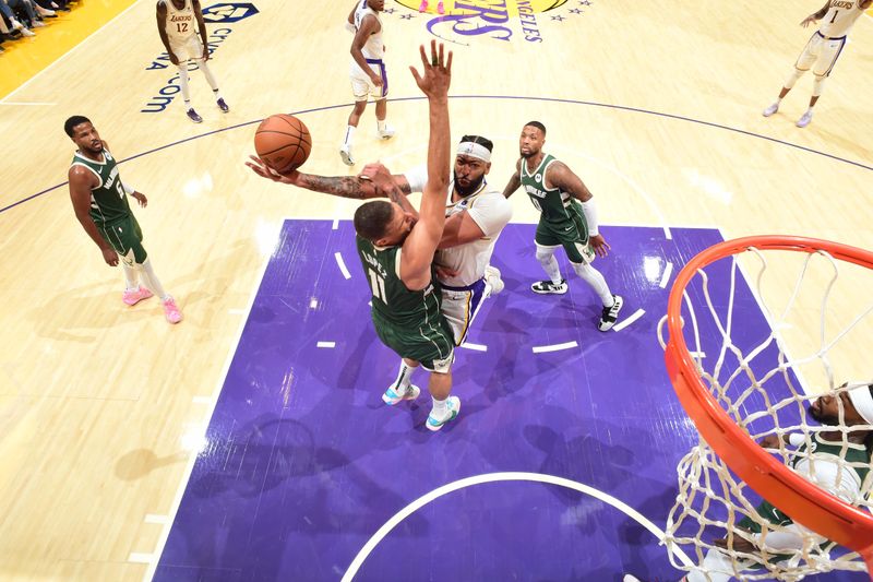 LOS ANGELES, CA - OCTOBER 15: Anthony Davis #3 of the Los Angeles Lakers drives to the basket during the game against the Milwaukee Bucks on October 15, 2023 at Crypto.Com Arena in Los Angeles, California. NOTE TO USER: User expressly acknowledges and agrees that, by downloading and/or using this Photograph, user is consenting to the terms and conditions of the Getty Images License Agreement. Mandatory Copyright Notice: Copyright 2023 NBAE (Photo by Adam Pantozzi/NBAE via Getty Images)