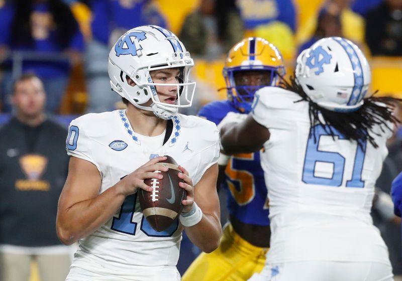 Sep 23, 2023; Pittsburgh, Pennsylvania, USA; North Carolina Tar Heels quarterback Drake Maye (10) looks to pass against the Pittsburgh Panthers during the first quarter at Acrisure Stadium. Mandatory Credit: Charles LeClaire-USA TODAY Sports