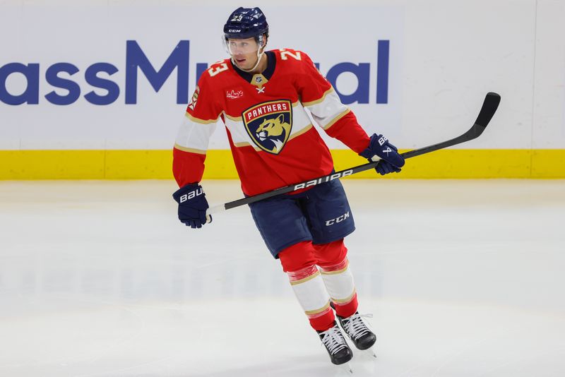 Apr 21, 2024; Sunrise, Florida, USA; Florida Panthers center Carter Verhaeghe (23) looks on after scoring against the Tampa Bay Lightning during the third period in game one of the first round of the 2024 Stanley Cup Playoffs at Amerant Bank Arena. Mandatory Credit: Sam Navarro-USA TODAY Sports