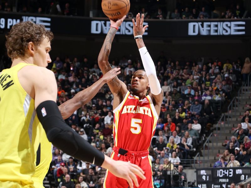 SALT LAKE CITY, UT - FEBRUARY 3: Dejounte Murray #5 of the Atlanta Hawks shoots a three point basket during the game against the Utah Jazz on February 3, 2023 at vivint.SmartHome Arena in Salt Lake City, Utah. NOTE TO USER: User expressly acknowledges and agrees that, by downloading and or using this Photograph, User is consenting to the terms and conditions of the Getty Images License Agreement. Mandatory Copyright Notice: Copyright 2023 NBAE (Photo by Melissa Majchrzak/NBAE via Getty Images)