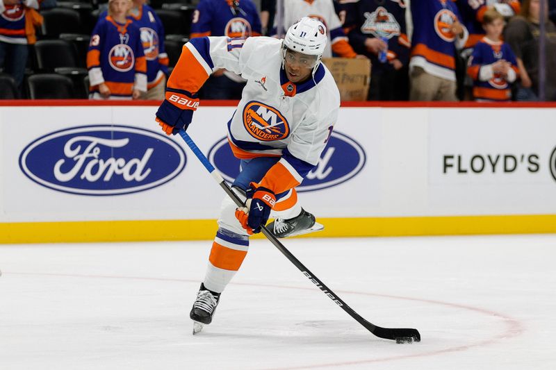 Oct 14, 2024; Denver, Colorado, USA; New York Islanders left wing Anthony Duclair (11) warms up before the game against the Colorado Avalanche at Ball Arena. Mandatory Credit: Isaiah J. Downing-Imagn Images