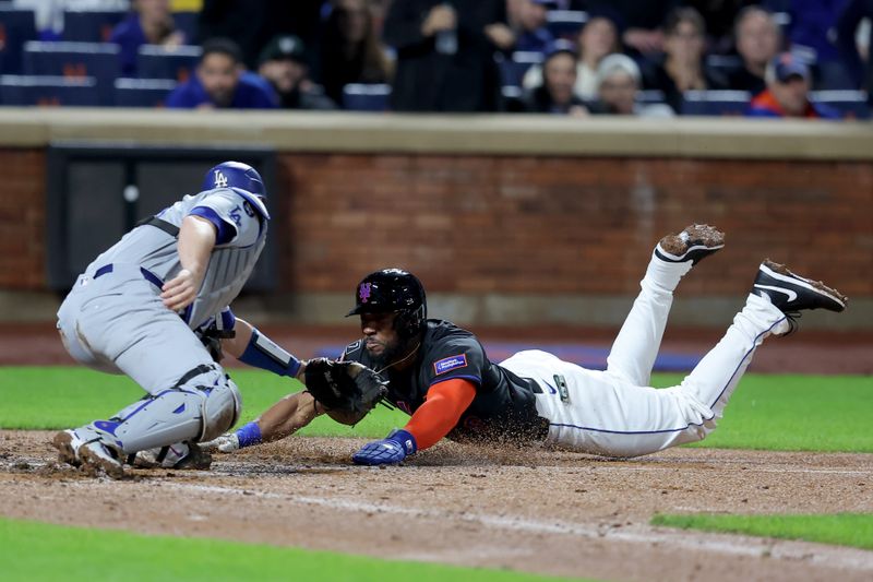 May 23, 2025; New York City, New York, USA; New York Mets designated hitter Starling Marte (6) scores a run against Los Angeles Dodgers catcher Will Smith (16) during the fourth inning at Citi Field. Mandatory Credit: Brad Penner-Imagn Images